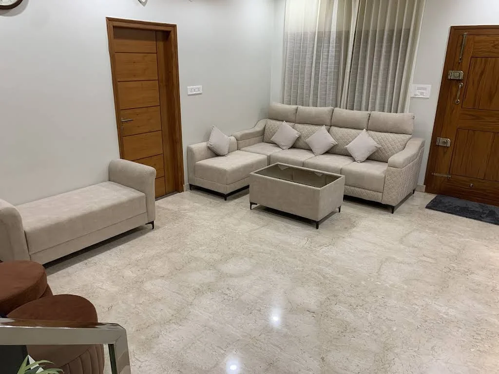 Beige sofa set with a bench and square centre table, shared with Aishwaryaa Srinivasaiah’s review