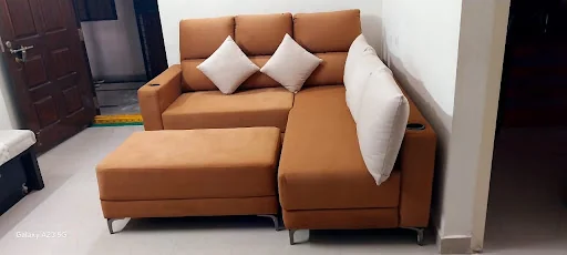 Caramel corner sofa with cream cushions, shared with Harish Immaneni’s review
