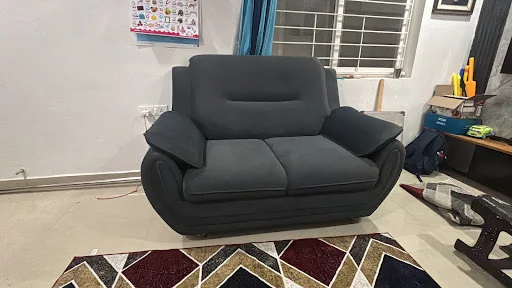 Dark grey reclining sofa, shared with Jallepalli Narender’s review